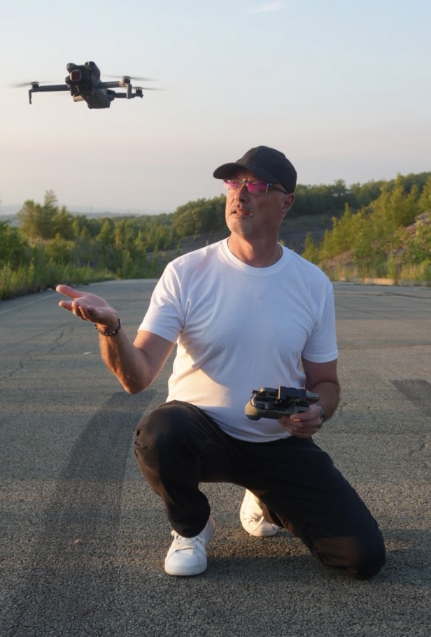 Founder and lead pilot of DroneNinja570 launching a drone in northeastern Pennsylvania